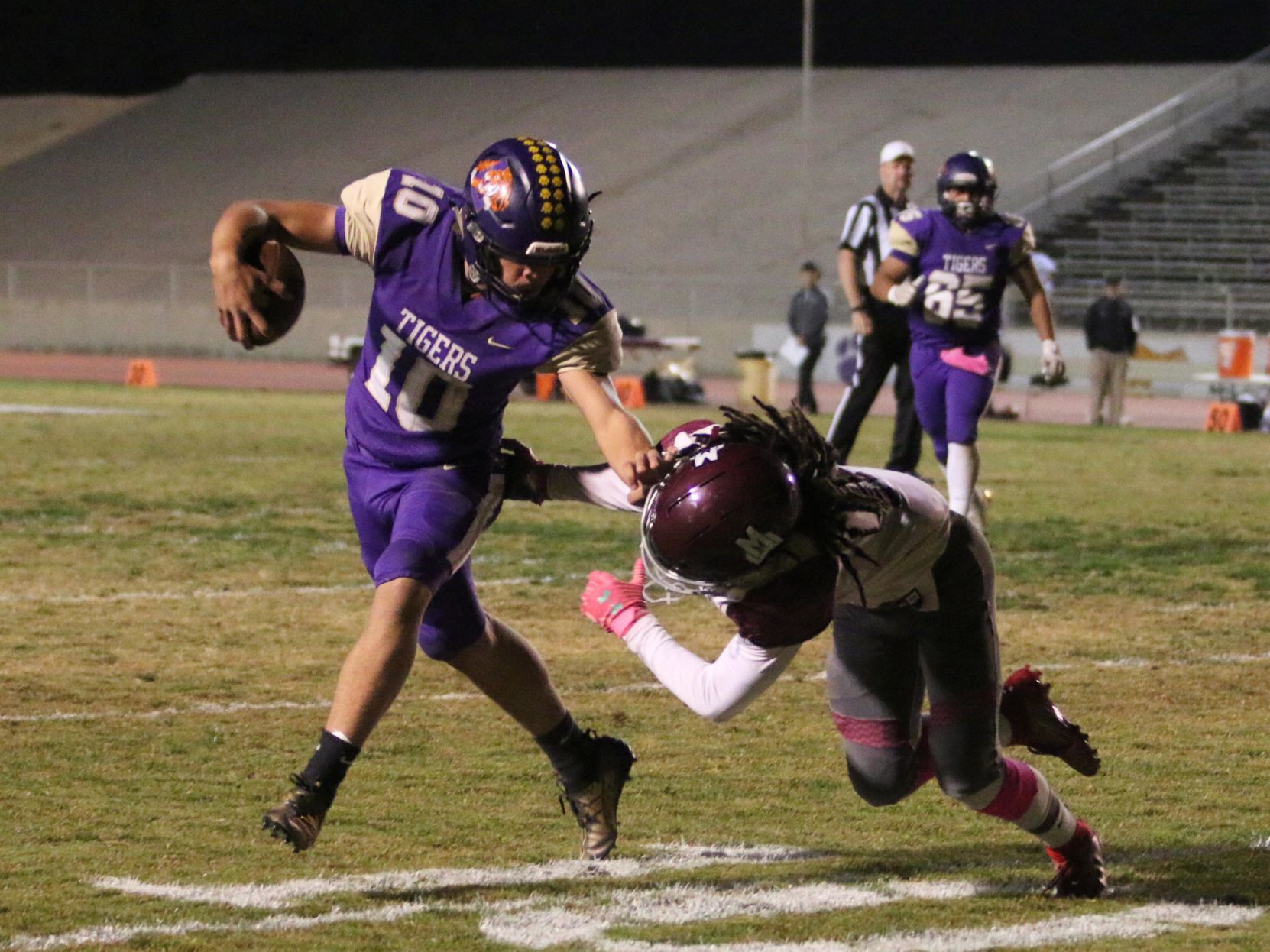 Tigers stay hot with 42-6 rout of Pioneers, clinch playoff spot
